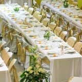 Wedding white reception place ready for guests. table repas
