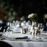 Beautiful table set for an event party or wedding reception . restaurant interior